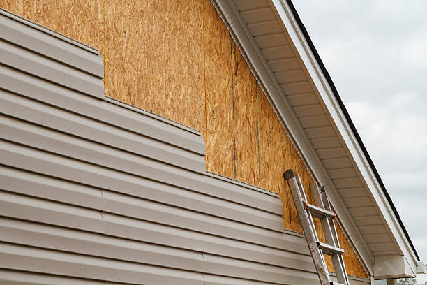 Professional Storm Damage Siding Repair technician working in Glen Burnie, MD